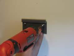 Installation STEP 1A : Install the Batteries a. Loosen the battery door screw. b. Open the battery co