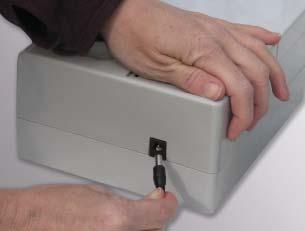 b. Install the adapter plug into the jack. c. Plug the adapter into the wall receptacle.
