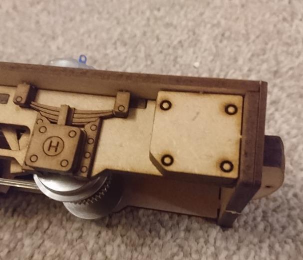 Fit the dummy adhesion weights to the chassis behind the buffer beam. You can use either one or two in each corner The chassis is now fully assembled, just add the batteries and switch to complete.
