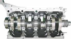 38 02 Crankshaft - Reassembly 1. Thoroughly clean the oil galleries and check the journal section and bearings. Replace if necessary. 2.
