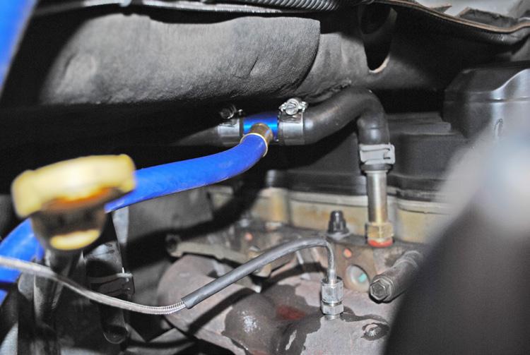 (Image 2) Image 2 Step 2: Install the blue T-fitting into the heater discharge hose and
