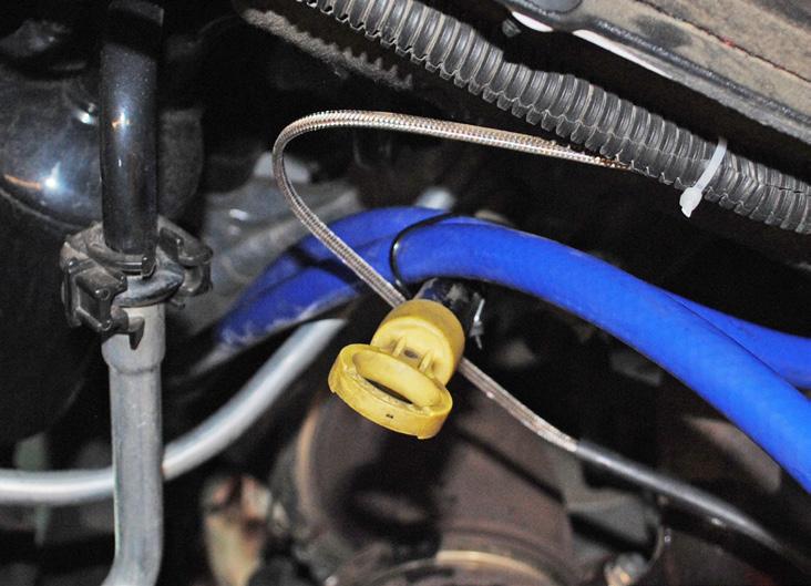 (Image 3) Step 3: Using the supplied zip tie, secure the coolant lines away from the