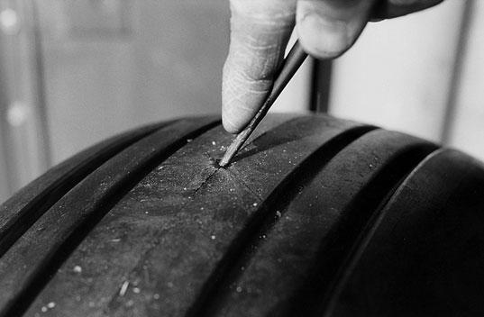 Tread chipping and chunking This is a condition visible at the edge of the tread rib in which small amounts of rubber begin to separate from the tread surface.