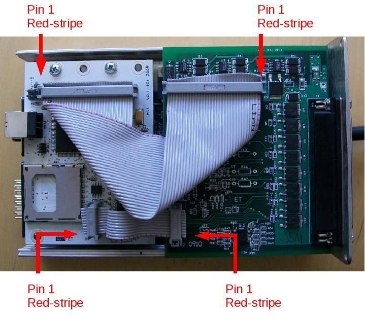 loosely screwing it to the end plate. Plug the ribbon cables into the MS3X card. Pay particular attention to the red stripe and orientation. Double check that ribbon cable plugs are aligned correctly.