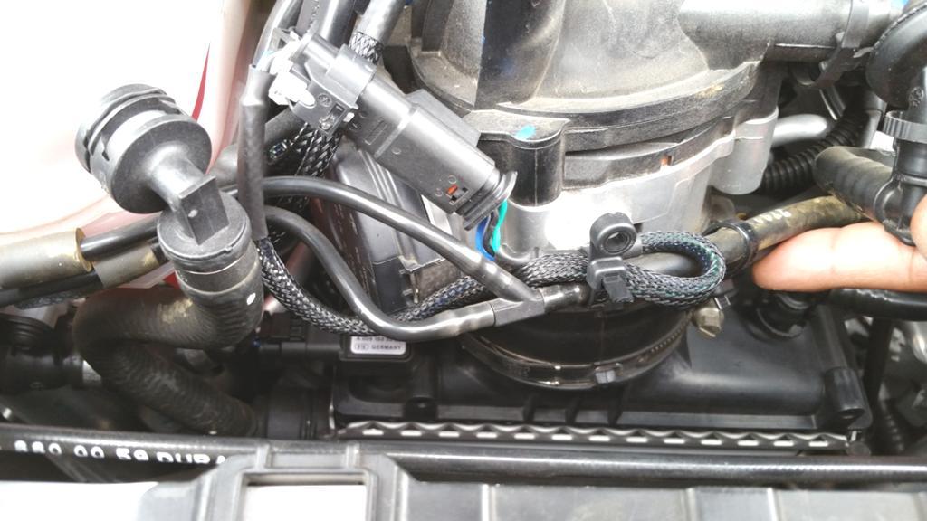14. Route the harness to Sensor #3, the intake charge pipe pressure sensor, located at the front of the engine. Intake Charge Pipe Pressure Sensor Secure harness away from cooling fan 15.