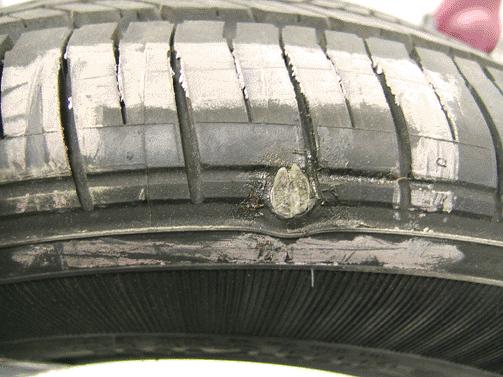 The following are photos of actual returned tires that DO NOT have warrantable conditions. The tire shown above has two non-warrantable conditions.