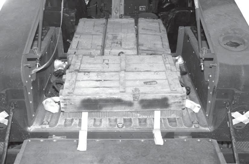 5 6 5 Position three 105-mm ammunition boxes lengthwise on top of the honeycomb. The boxes should be flush with the front edge of the 36- by 16-inch piece of honeycomb.