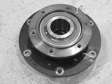 Install a new outer seal (i) on the shaft of the larger bearing flange. 6. Press the bearing (h) into the smaller bearing flange (f). h f e g wc_gr004182 7.