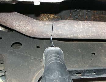 Removal of Stock Exhaust System In these steps you will remove the stock exhaust system. 1.