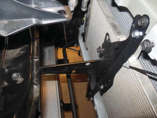 The FJ will be located in the same manner using the provided hood support bracket. 204.