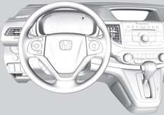 Use the steering wheel controls to make and enter selections when the vehicle is stopped.