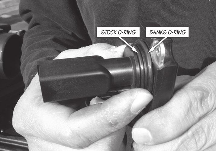 9. Locate the Banks MAF sensor o-ring supplied in your kit. Install Banks o-ring as shown. Ensure o-ring is flush to MAF sensor edge as shown Note: Retain stock o-ring.