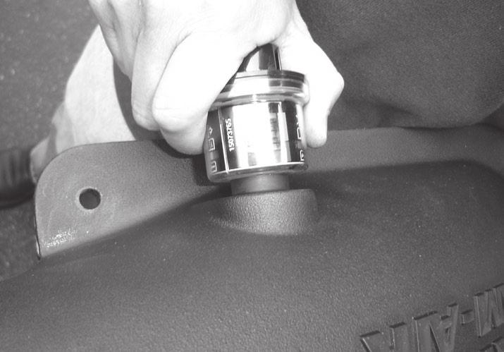 removed air filter minder and install into the rubber grommet. Make sure air filter minder is installed flush to rubber grommet. See Figure 14. 15.