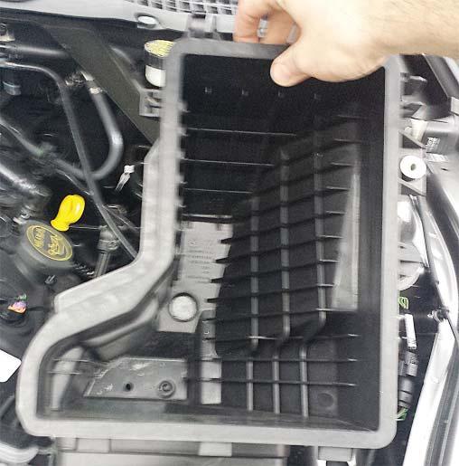 Remove the air box tray and dirty air
