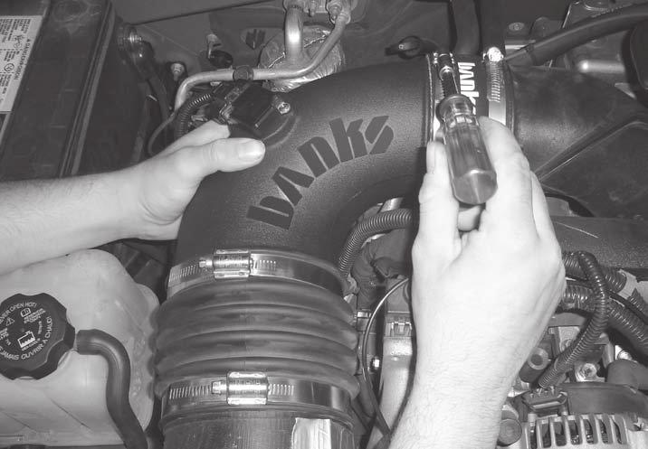 clamps. Attach the turbo intake hose to the turbo intake tube. Leave the hose clamps loose. 19. Install the Banks Ram-Air intake tube into the Banks bellows.