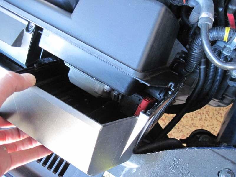 2. Remove black plastic ECU Cover by pulling straight up.