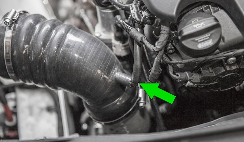 Re-install the vacuum line onto the barb on the new turbo inlet silicone.