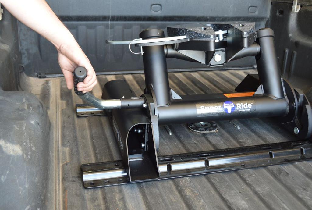 Then pull the handle outwards and then towards the rear of the truck bed again. 2.