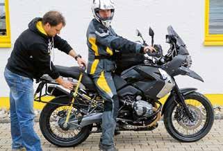 1 To adjust the height of the bike, measure the distance between the rear axle and a reference point on the bike.