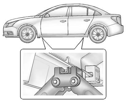 Vehicle Care 285 7. Position the jack lift head at the jack location nearest the flat tire. The location is indicated by a notch in the flange. The jack must not be used in any other position.