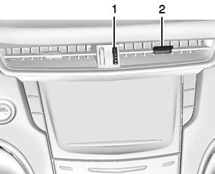 Climate Controls 185 Y/ [/\ (Air Delivery Mode Control) : Press the desired mode button on the touch screen or the MODE button on the rear faceplate to change the direction of the airflow in the rear