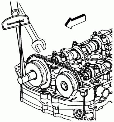 Page 26 of 29 34. Using a 23 mm wrench, engage the hex on the intake camshaft, and using a torque wrench, tighten the camshaft actuator bolt.