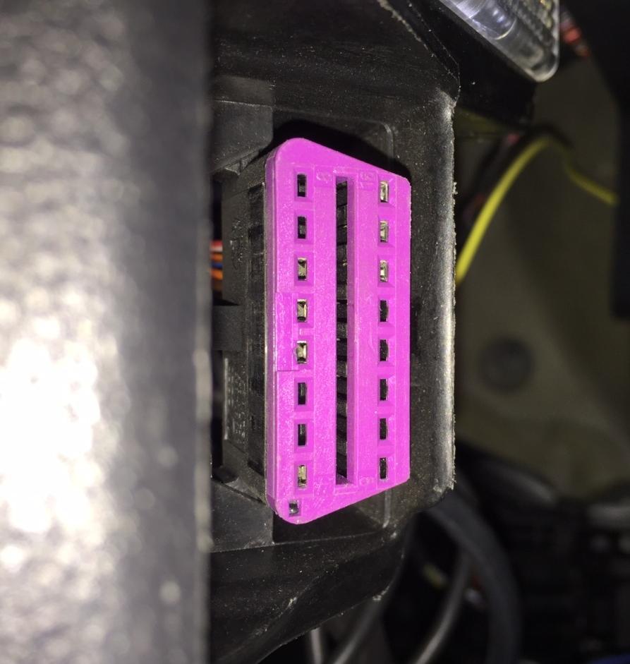 RIGHT HAND DRIVE INSTALL The OBD plug (purple) can be found on the panel above the pedals of the car on the right hand side as pictured below: The OBD plug will go into the engine bay as per LHD