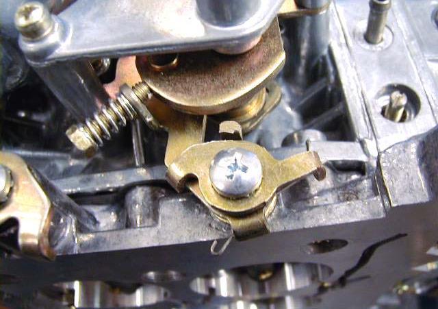 Figure 6 6. Using the three- (3) middle-length screws from the kit, secure the choke housing to the main body (see Figure 7).