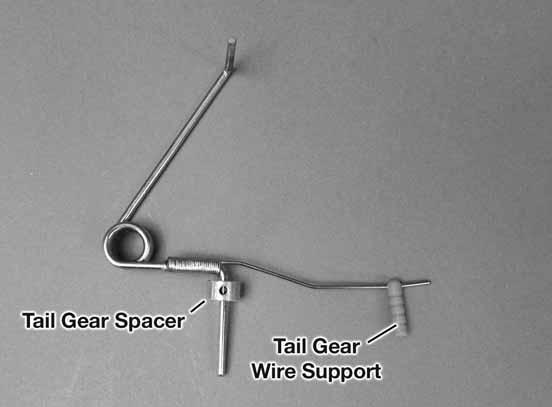 4. Slide the tail gear spacer and the tail gear wire support