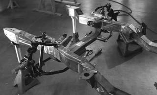 The steering rack is subsequently secured in place using the two billet-aluminum steering rack clamps, and?