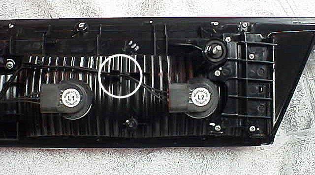 19) At the center of the fixture, do the following: A) Slide the OEM style