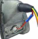 If applicable, mount the reverse light back on top of the turn signal panel using the provided LONG SCREWS.