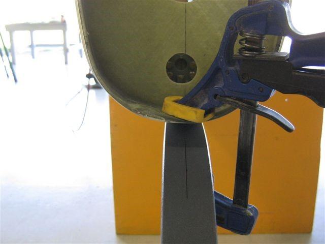 4.Clamp to aft flange of bulkhead E Note: Align tailwheel springs to the masking tape line created in Step h