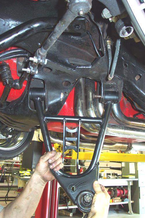 Installation Instructions 1. After removing the factory lower control arm, clean the bushing mounting surfaces on the frame and lubricate with lithium grease. 2.