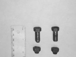 Figure 1. Broken coupling bolts Figure 2. Coupling on 600 HP motor During engineering of the drive modification, the compressor manufacturer had done a torsional design analysis.
