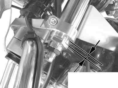 Relevance of Front Fork and Tire Upright Front Fork Clamp the top bridge at the highest point of the straight portion to avoid the tapered portion of front fork.