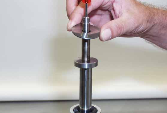 check valve setting - Piston-rod nut Assemble the