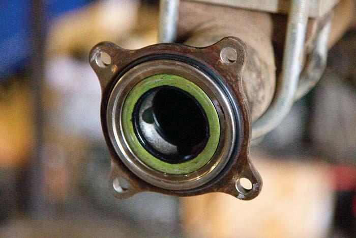 Remove the old bearing and seal from the bearing pocket if you