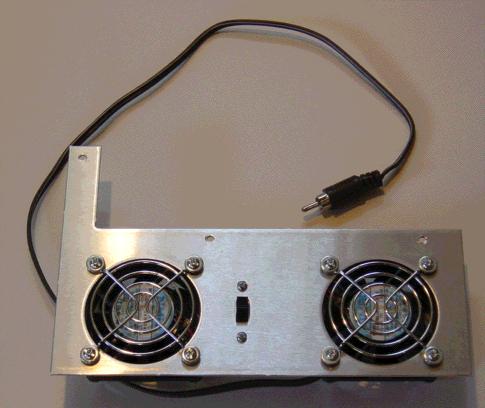 In a recent email thread of the Collins Collector s Club, Mac McCullough/W5HPM described how he mounted a small muffin fan to the backside of the resistor cage on the back of the 516F-2 power supply.
