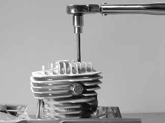 Push rear manifold onto cylinder intake. C. Align rear manifold seam with cylinder and crankcase seam. 13.