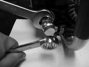 1 Loosen hose clamp screw. 14.