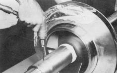 6. Place the sleeve O-ring (3-914-9) onto the shaft, into the sleeve counterbore.