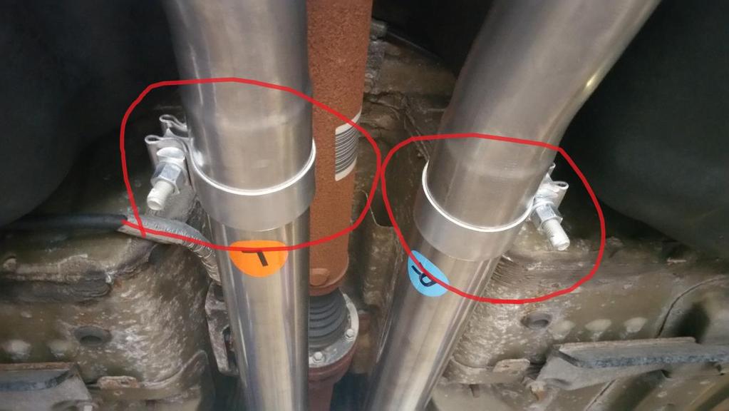 15. Move the exhaust pipes around until you are happy with the positioning and tighten both clamps (i.e. both the axle-back clamp and the over-axle pipe clamps) just tight enough to hold them on using the ratchet, short extension and 15mm socket.