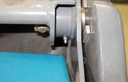 MAINTENANCE FRONT WHEEL BEARINGS Repack and adjust the front wheel bearings every 400 hours of operation.