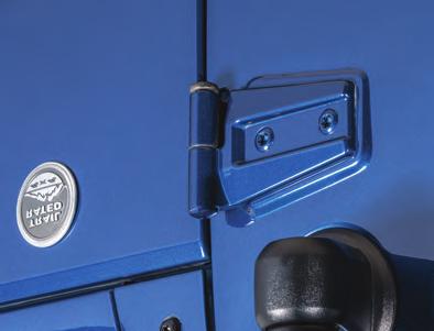 Remove the two T-47 Torx door nuts that retain the door to the hinge knuckles. Carefully disconnect the door wiring harnesses and check straps and swing the door at approximately 90 to the vehicle.