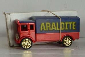 4.124B Diecast - Corgi 'modern' issues No. ref (issued 1996) Small format A.E.C. Box Van, red with blue body lettered 'Araldite'.