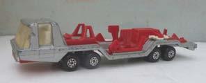 Red with silver upper rampways. 'Auto Transport' paper decals at front of semitrailer. Fair/good condition. Price ( ): 12.