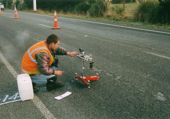 MANAGEMENT OF SKID RESISTANCE UNDER ICY CONDITIONS ON NZ ROADS from a fixed point, sweeps across the surface underneath.