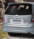 Exterior STYLING ^ Grandis shown with rear spoiler, rear grip garnish, rear parking assistance and sports muffler. ^ Sports muffler Stainless steel with chromed end pipe.