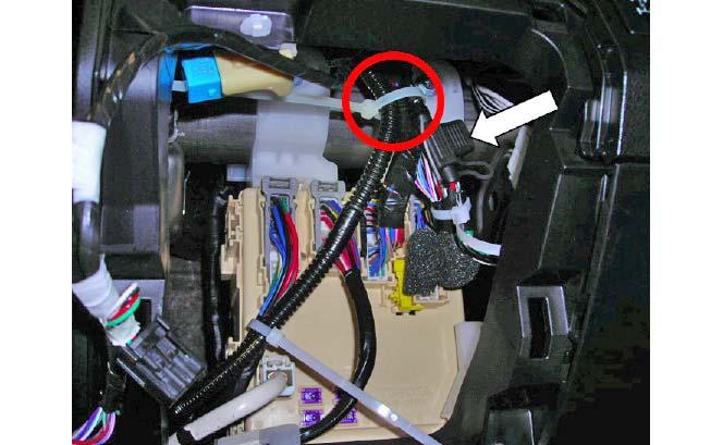 4-3 (e) Route the driver side harness, shorter length, back down toward the junction block and secure the driver side harness